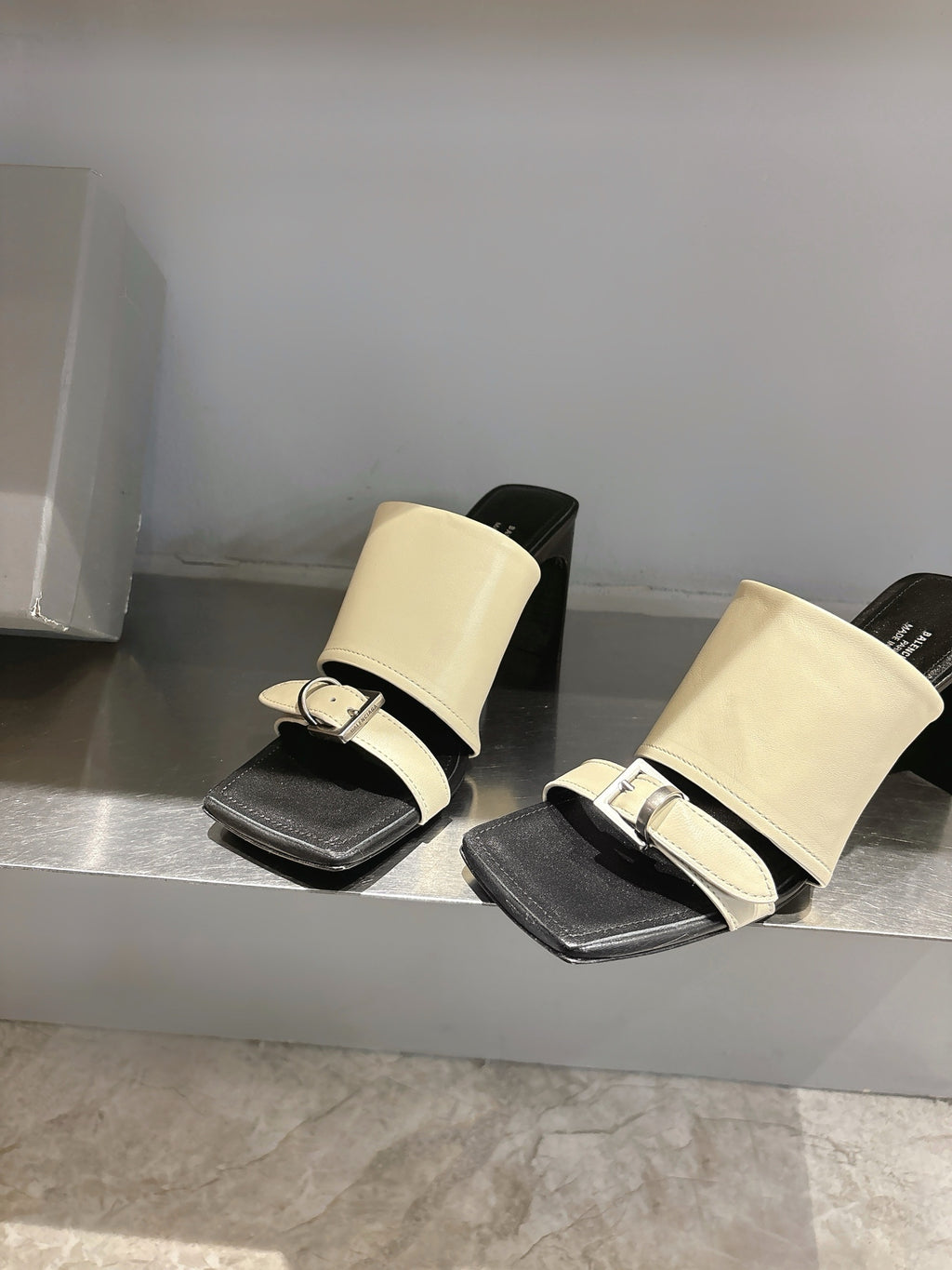Balenciaga cream and black slide sandals with square-toe silhouette
