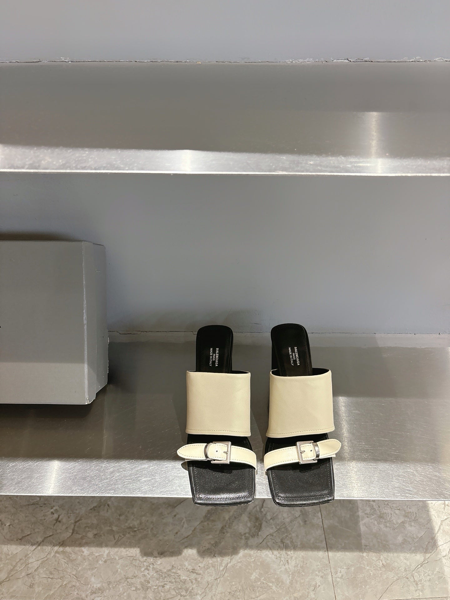 Balenciaga cream and black block-heel sandals with front buckle detail