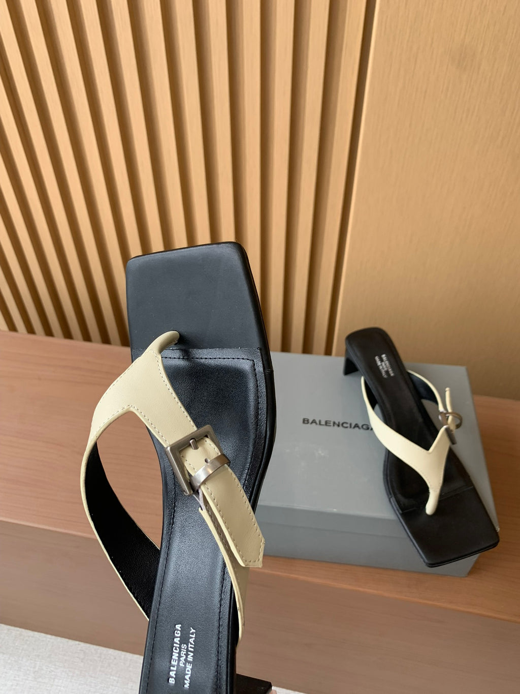 Balenciaga thong sandals, black and cream with metal buckle strap detail