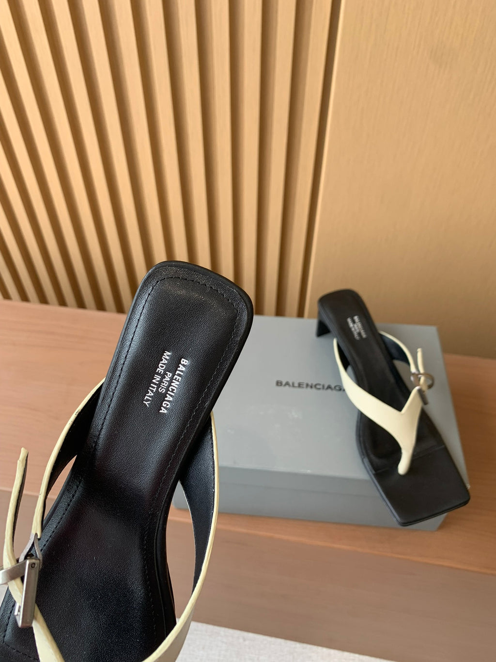 Balenciaga thong sandals, black mule-style straps with cream V-strap and buckle