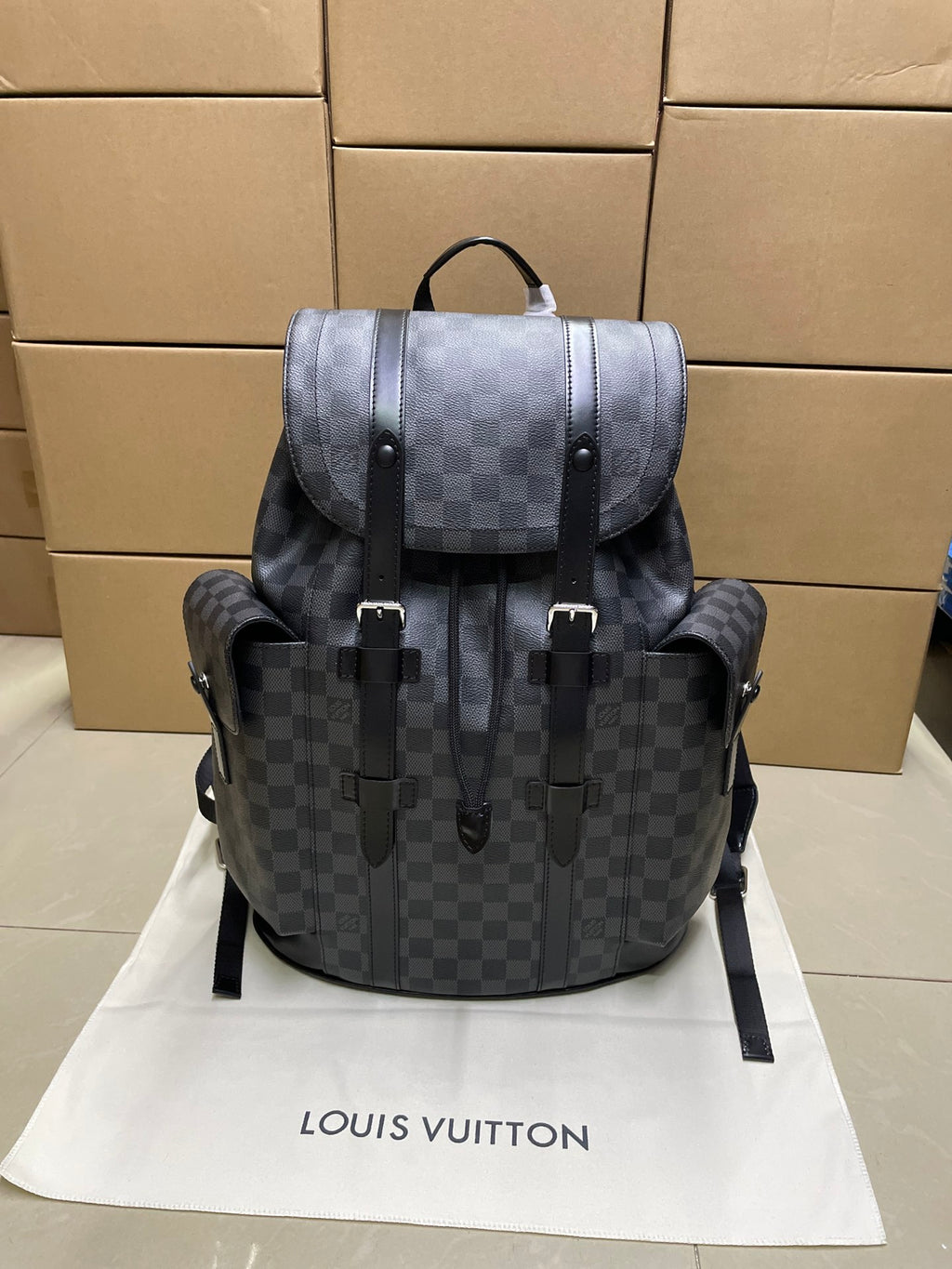 Men's Louis Vuitton Damier-check backpack with flap top and adjustable shoulder straps