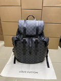 Louis Vuitton checkered canvas backpack with flap front and top handle, dark gray/black
