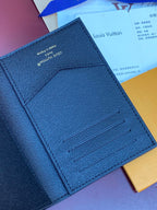 Small bag interior view with stitched slots and embossed branding.
