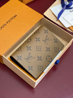 Small bag with beige monogram pattern, close view in open gift box.