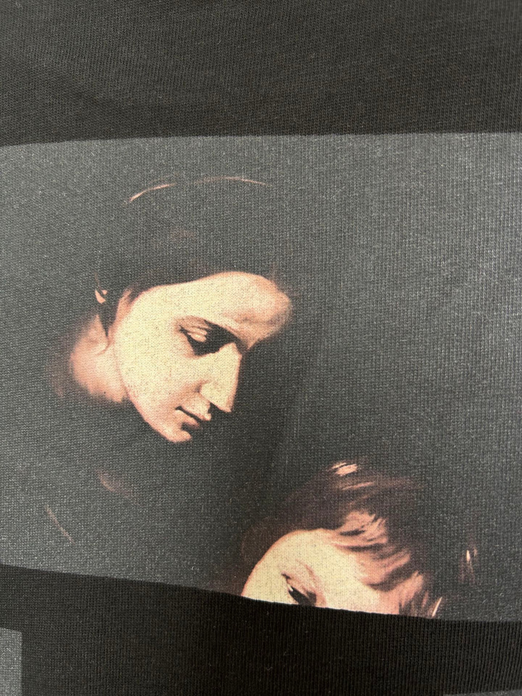 Off White black T-shirt with photo graphic of faces beneath dark X