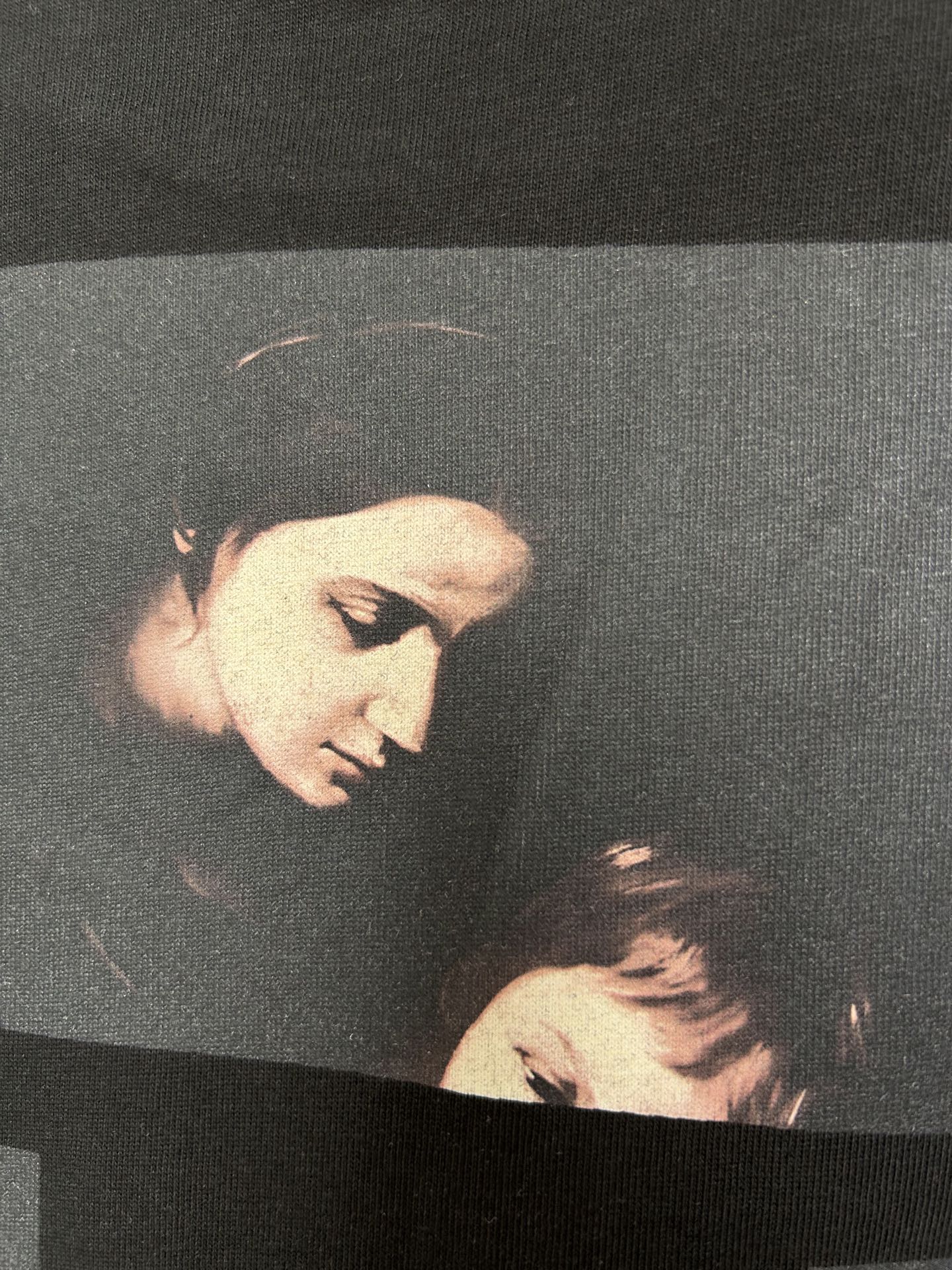 Off White black T-shirt with photo graphic of faces beneath dark X