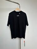Off White black graphic T-shirt on hanger, OFFS logo at chest