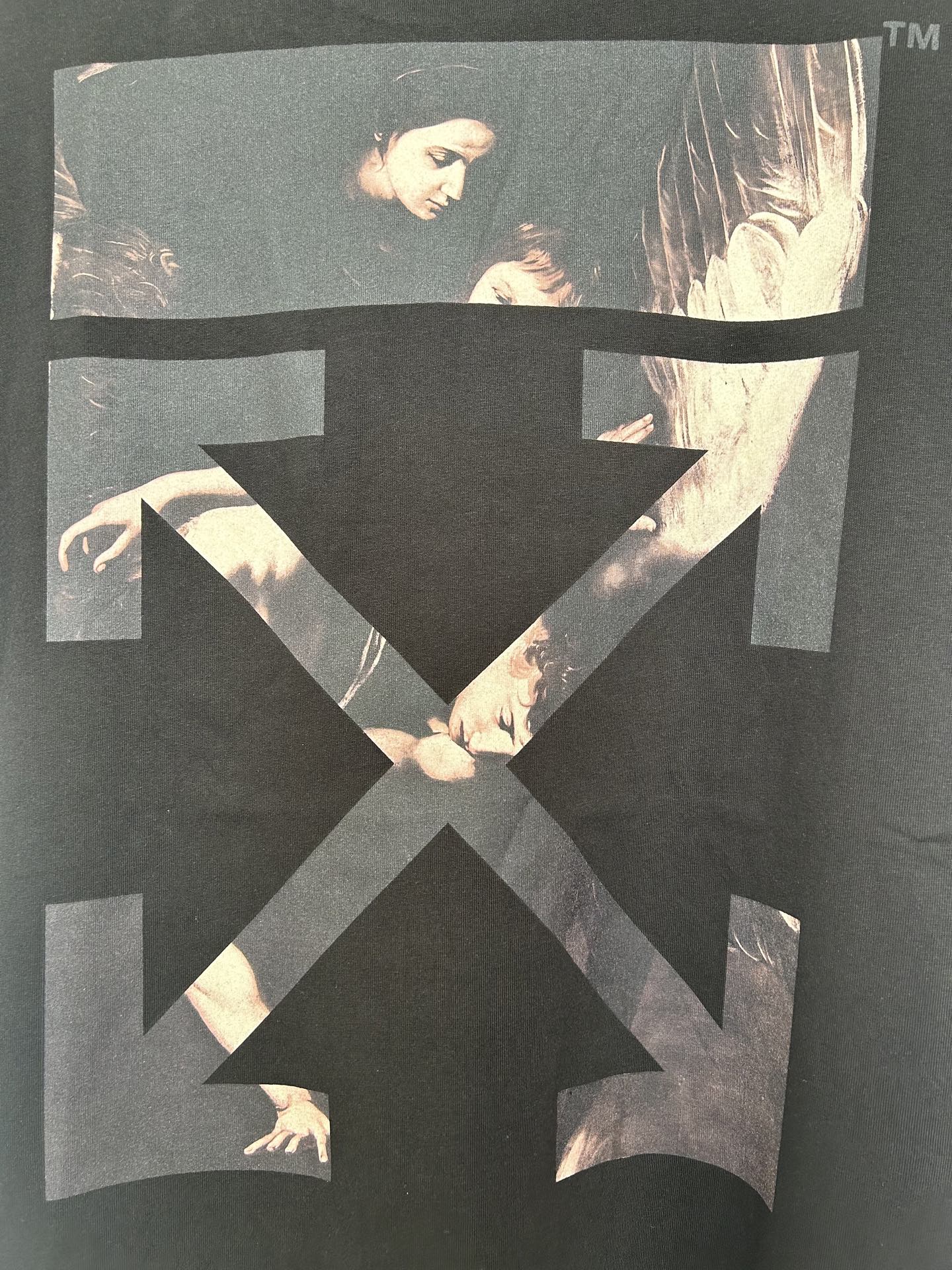 Off White black T-shirt with large dark X graphic over photo print