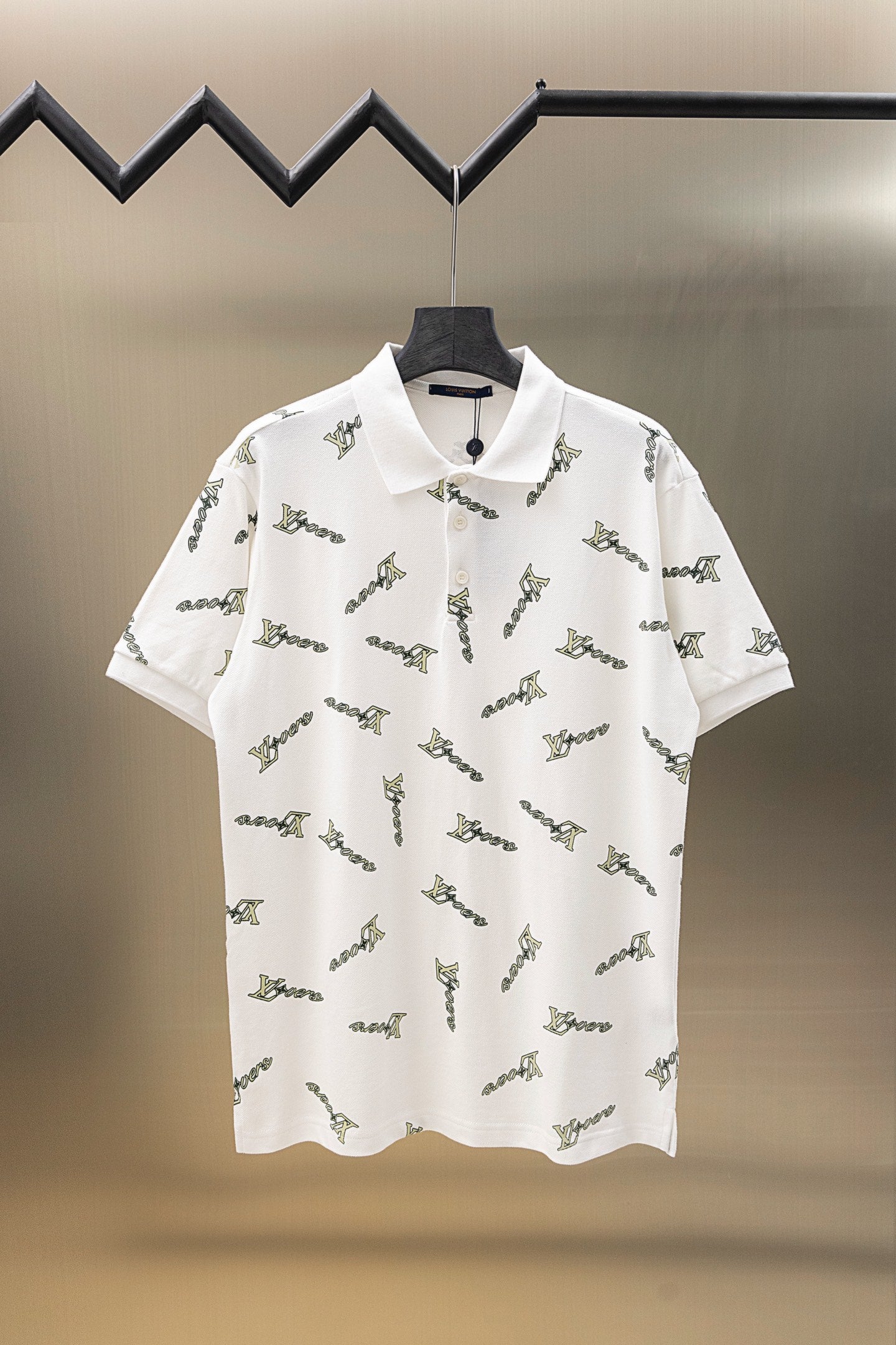 White short-sleeve polo shirt with allover Louis Vuitton-style logo print