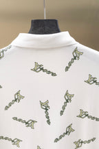 White polo shirt back with high collar and repeating Louis Vuitton-style logo print