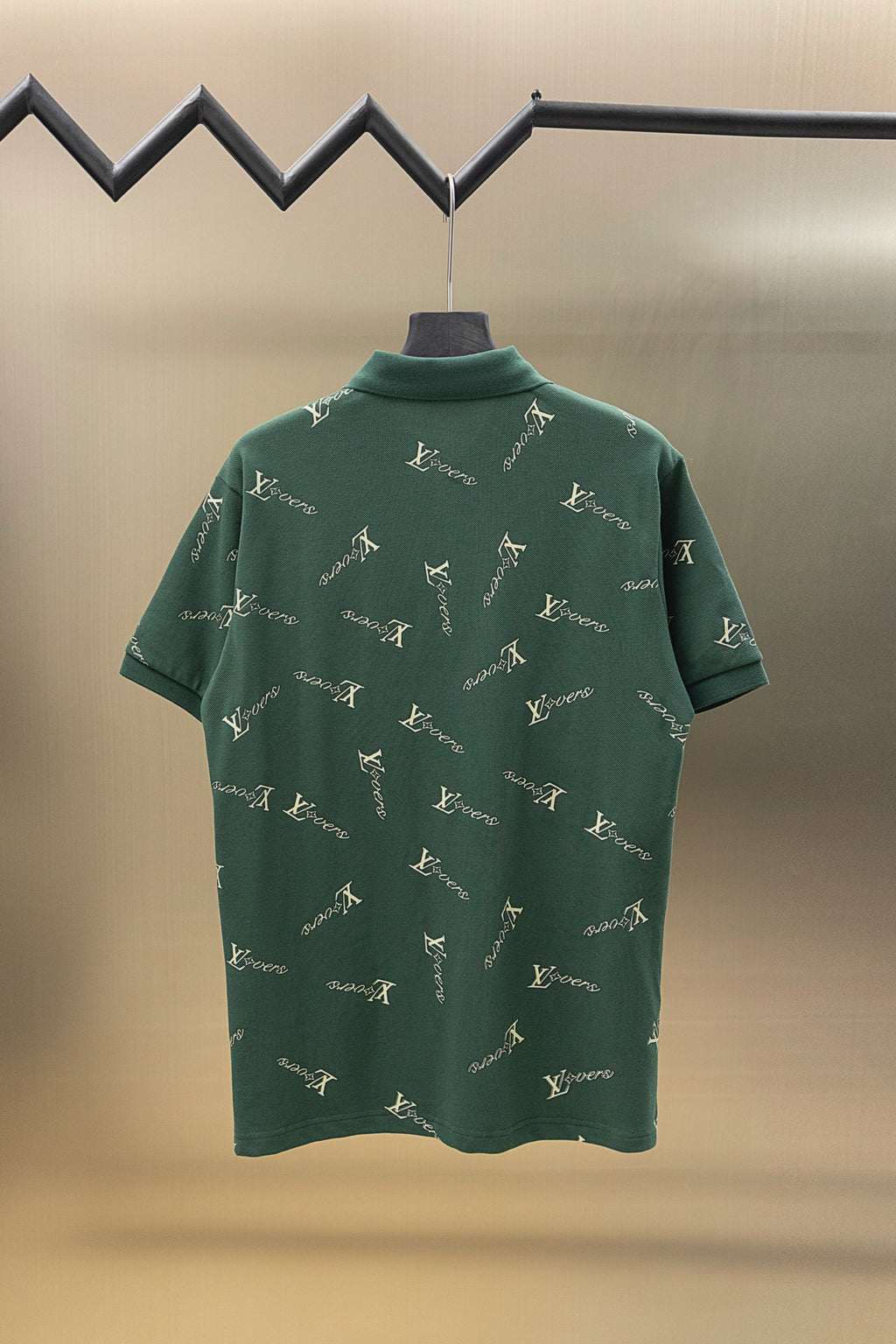 Louis Vuitton polo shirt in dark green with repeating logo pattern and short sleeves, back view
