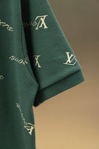 Louis Vuitton dark green polo sleeve with repeating logo pattern and ribbed cuff