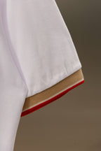Burberry polo shirt sleeve hem with tan stripe and red edge trim