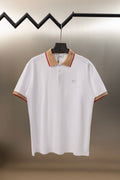 Burberry white polo shirt with button placket and tan collar in red trim