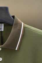 Burberry polo shirt shoulder and collar detail with striped trim and button placket