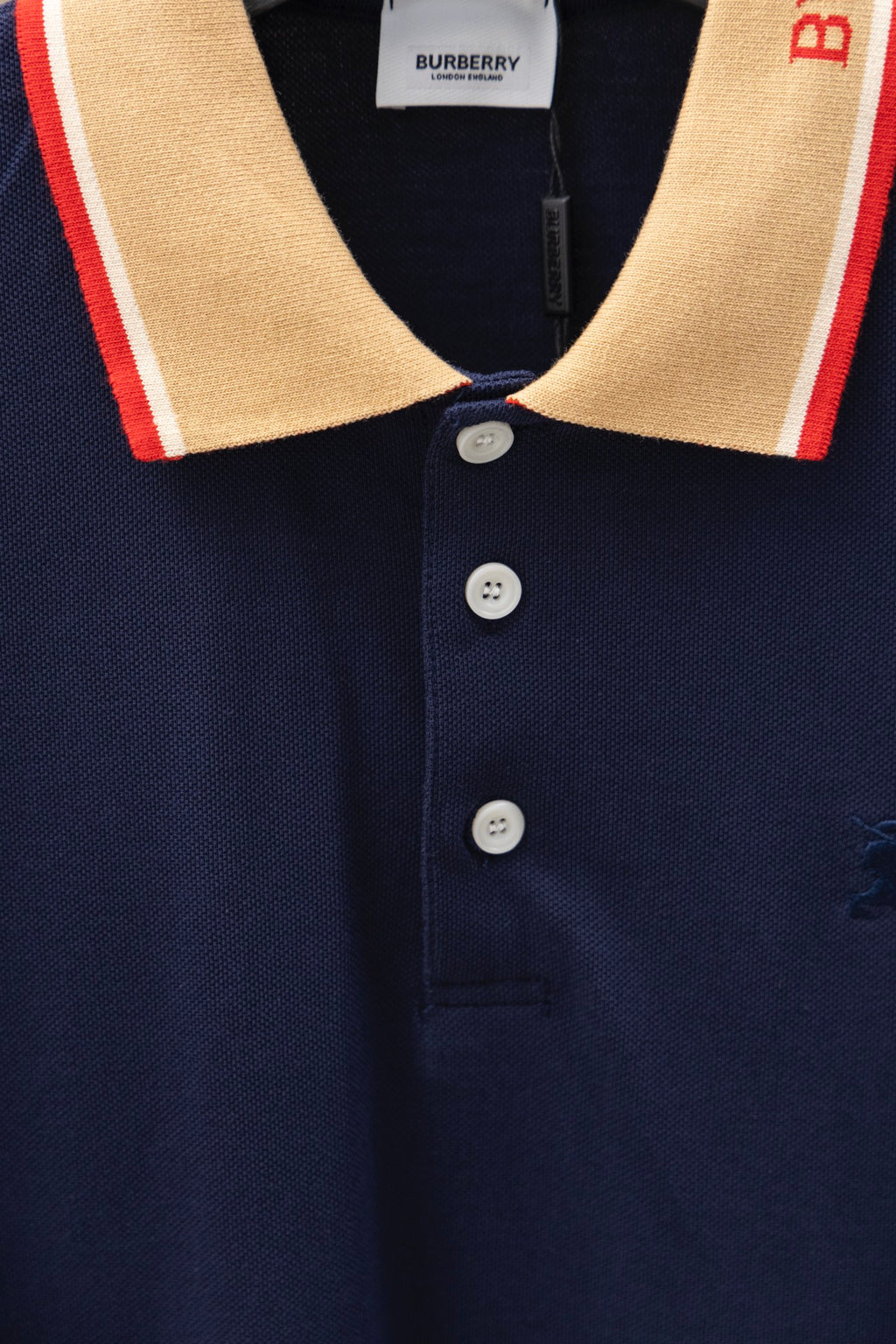 Burberry short-sleeve polo shirt, navy with button placket and striped collar trim