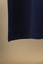 Navy polo shirt hem view with clean straight bottom edge