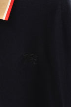 Burberry navy polo shirt with embroidered horse logo on chest