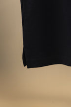 Burberry navy polo shirt hem with side seam and clean finish