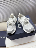 White mesh unisex sneakers with black Dior logo tag and white laces