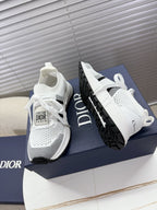 White mesh unisex sneakers with black side stripe and chunky black sole