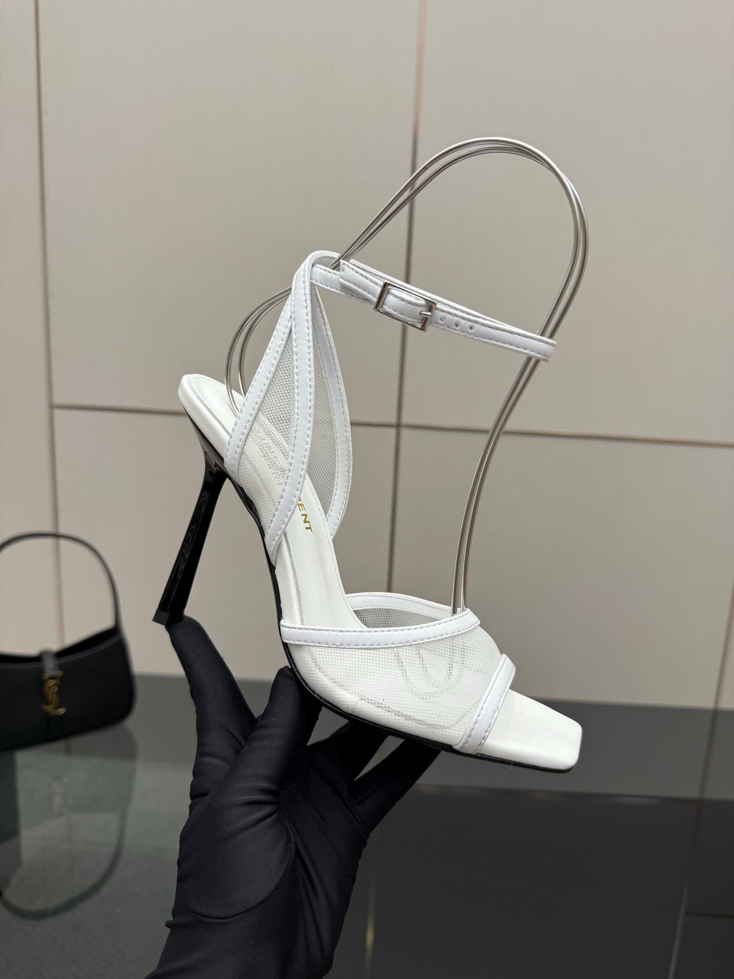 White women’s heeled sandal close side angle, open toe and ankle strap