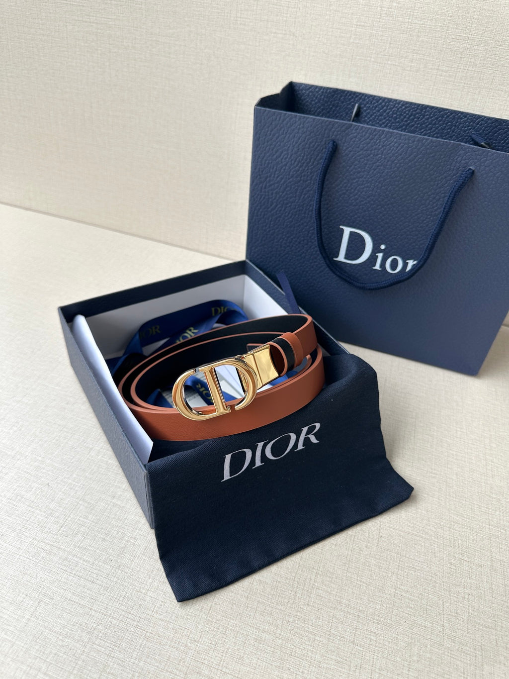 Dior leather belt in tan with gold-tone double D buckle