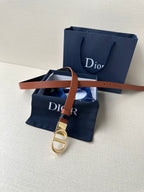 Dior leather belt with tan strap and gold-tone clasp