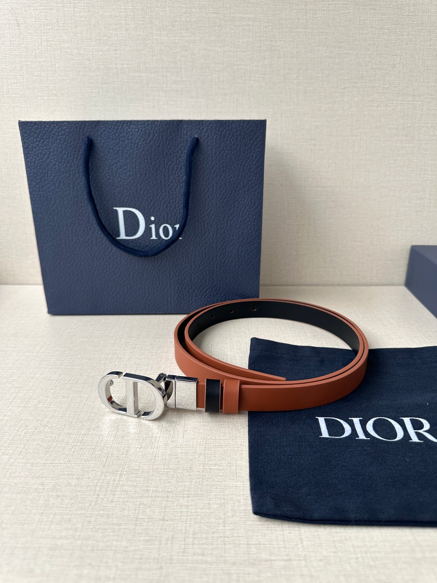 Dior leather belt in tan with silver-tone buckle and loop holes