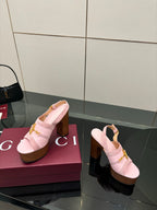 Gucci ladies pink platform heeled sandals, side angle showing chunky wooden heel