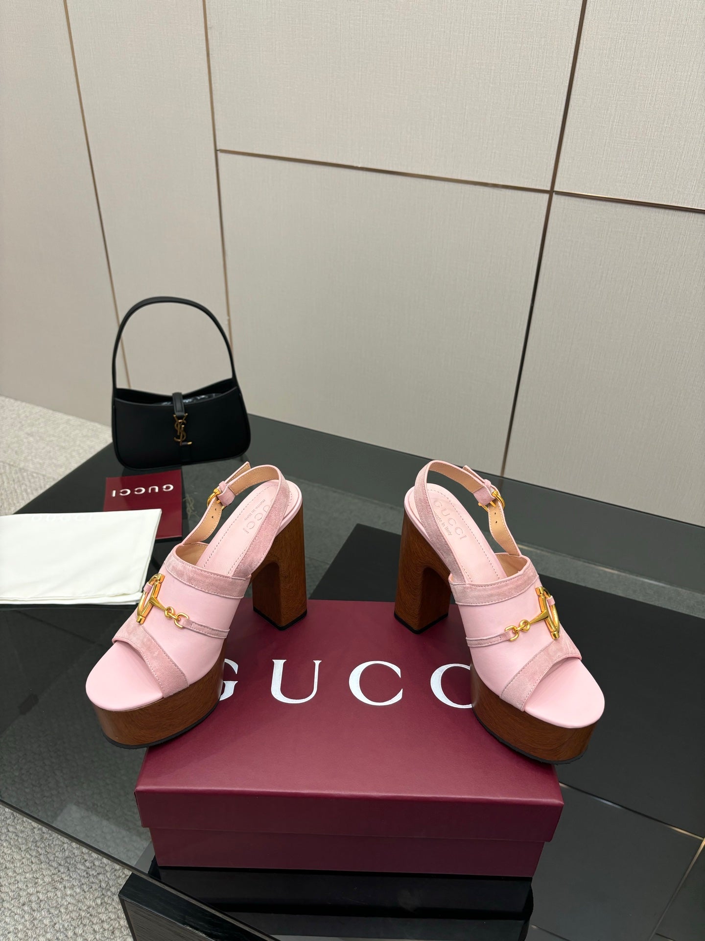 Gucci ladies pink platform heeled sandals pair on box, gold buckle strap visible