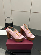 Gucci ladies pink platform heeled sandals with thick wooden heel and gold buckle