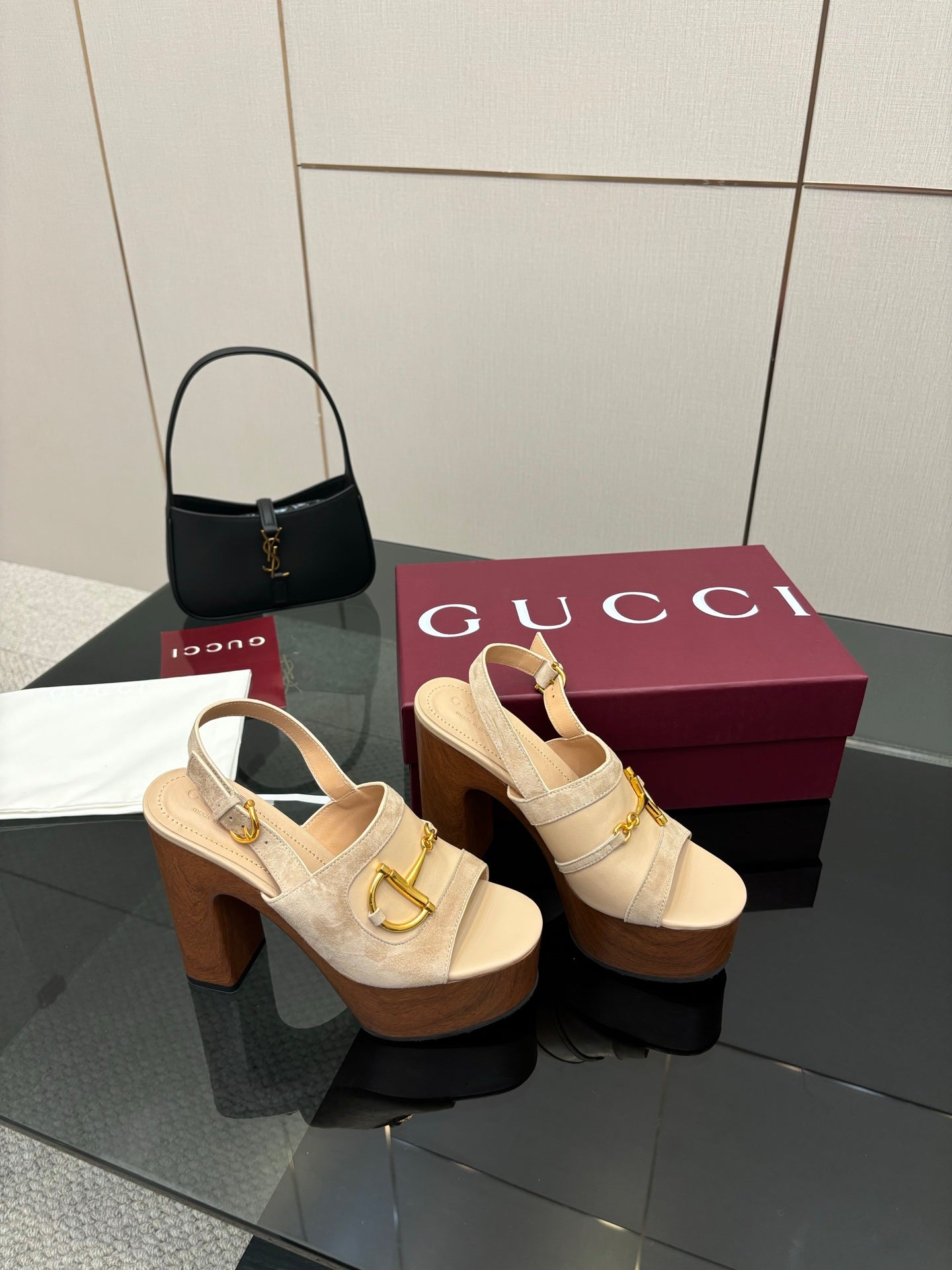 Women's Gucci cream platform mules with gold buckle detail and chunky block heel