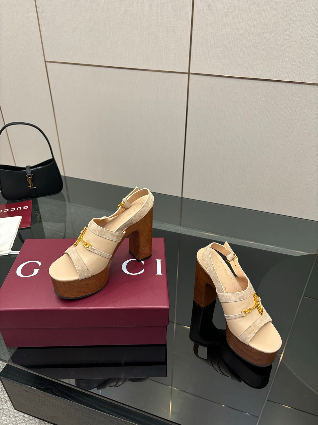 Women's Gucci cream suede platform mules, gold buckle straps, side profile on block heel