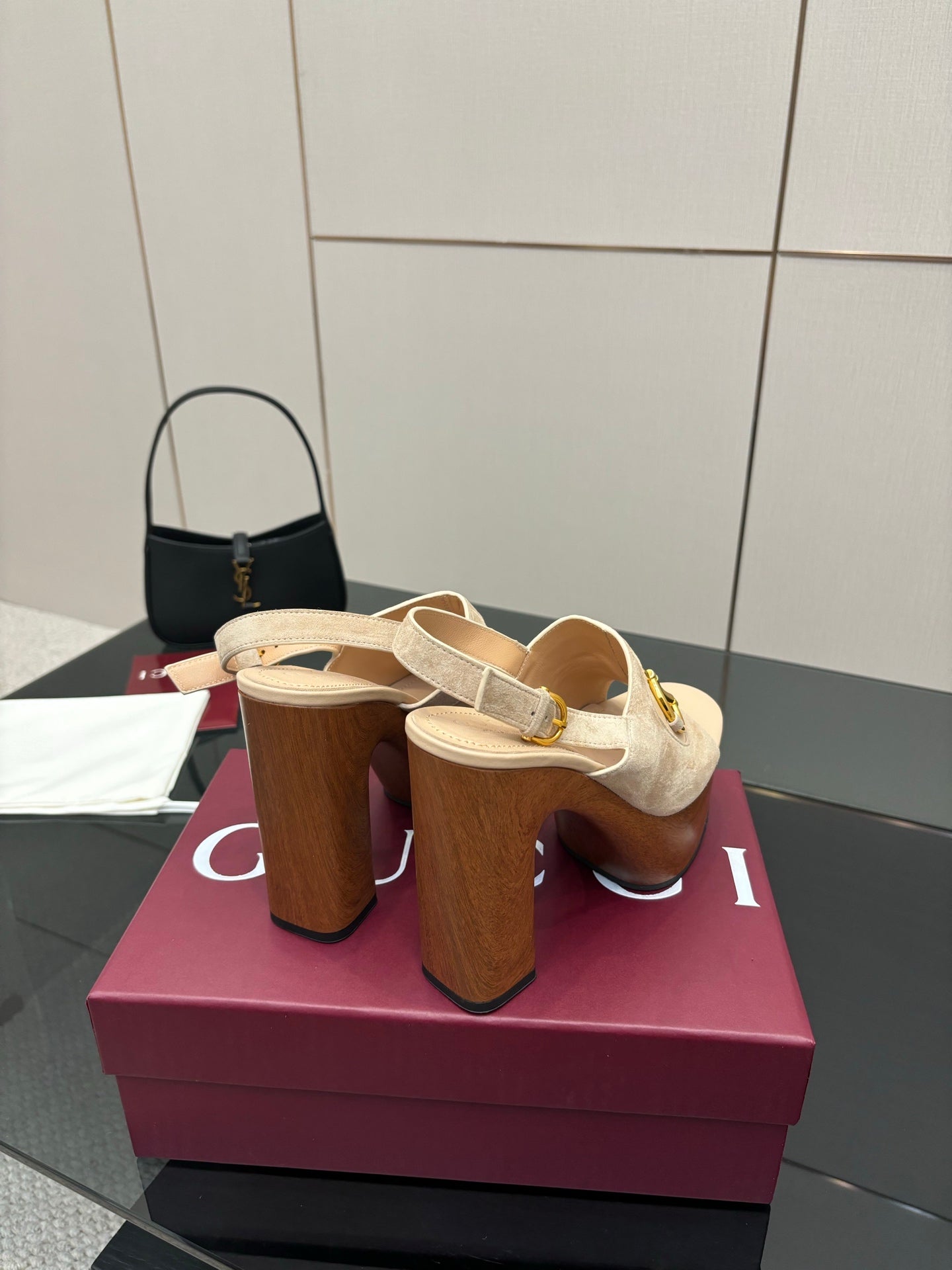 Women's Gucci cream platform mule sandals with gold buckle strap and thick block heel