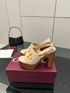 Women's Gucci cream suede platform mules with gold buckle strap, tan block heel