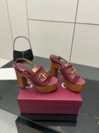 Gucci ladies platform sandals, burgundy open-toe style with gold bit hardware
