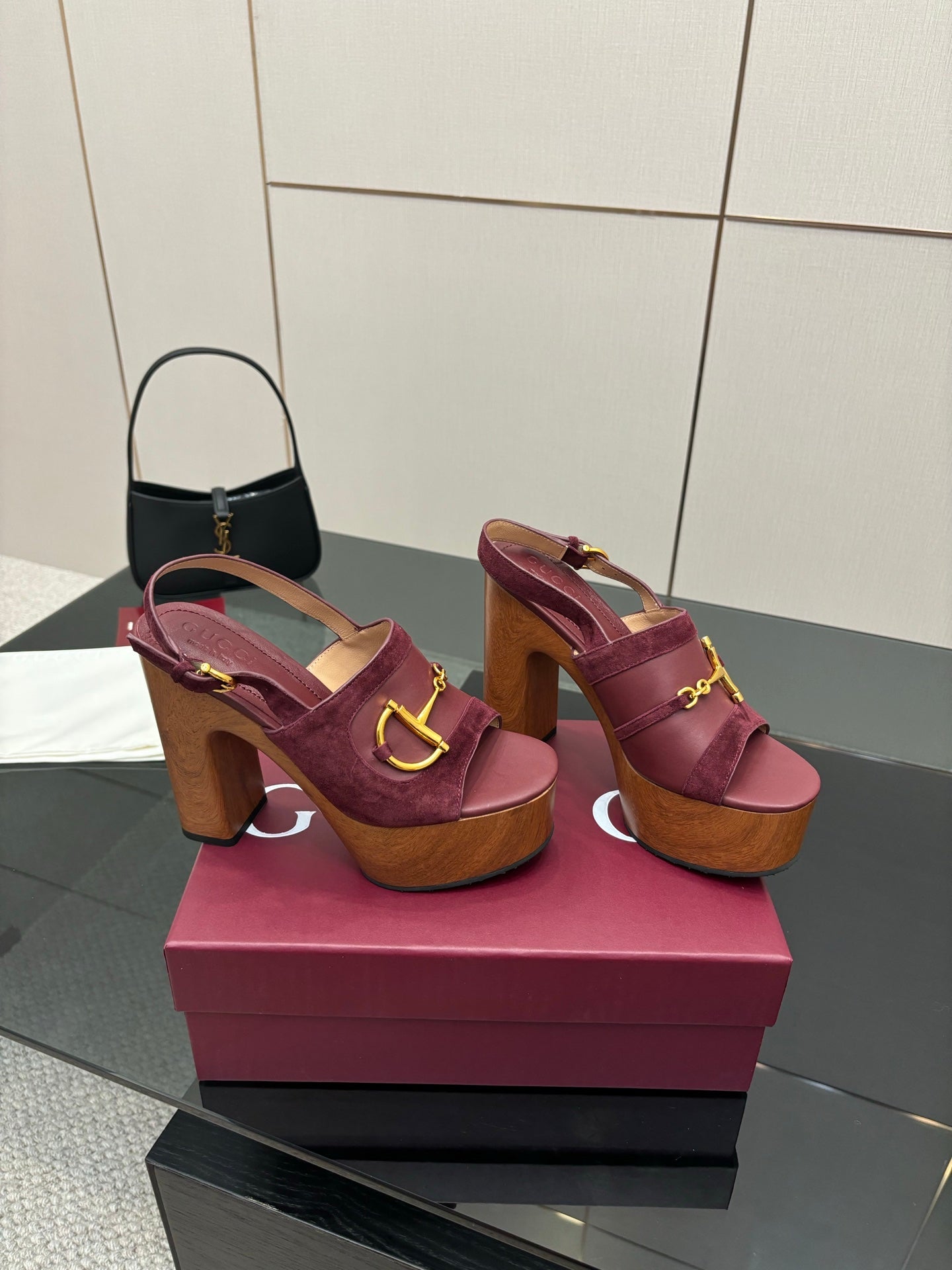 Gucci ladies platform sandals, burgundy open-toe style with gold bit hardware