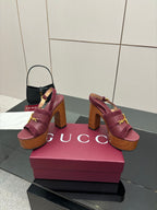 Gucci ladies platform sandals pair view, burgundy straps with gold hardware, block heel