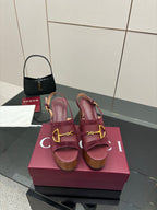 Gucci ladies platform sandals with burgundy leather straps, gold hardware, chunky heel