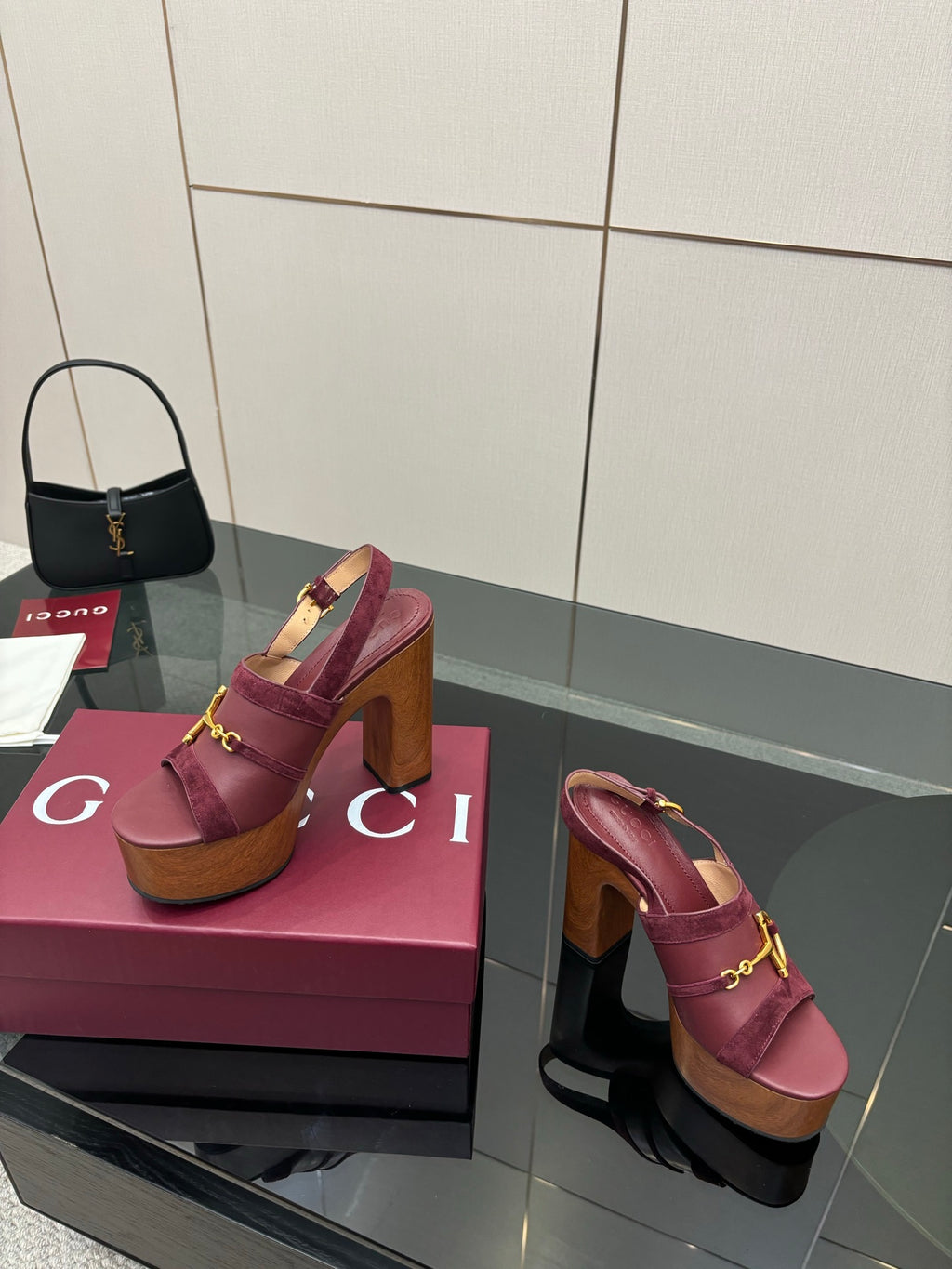 Gucci ladies platform sandals, burgundy slide-on design with gold bit hardware, wood sole