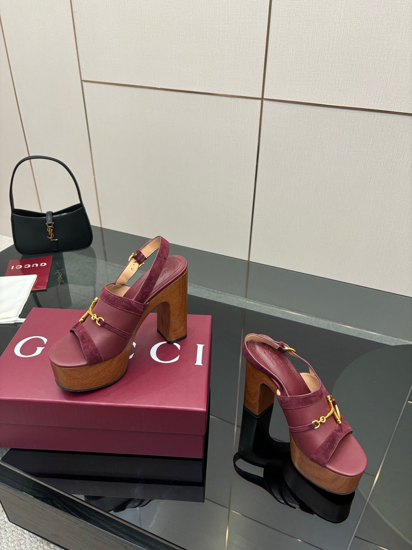 Gucci ladies platform sandals, burgundy slide-on design with gold bit hardware, wood sole