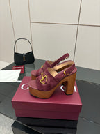 Gucci ladies platform sandals on burgundy straps and gold buckles, high wooden heel