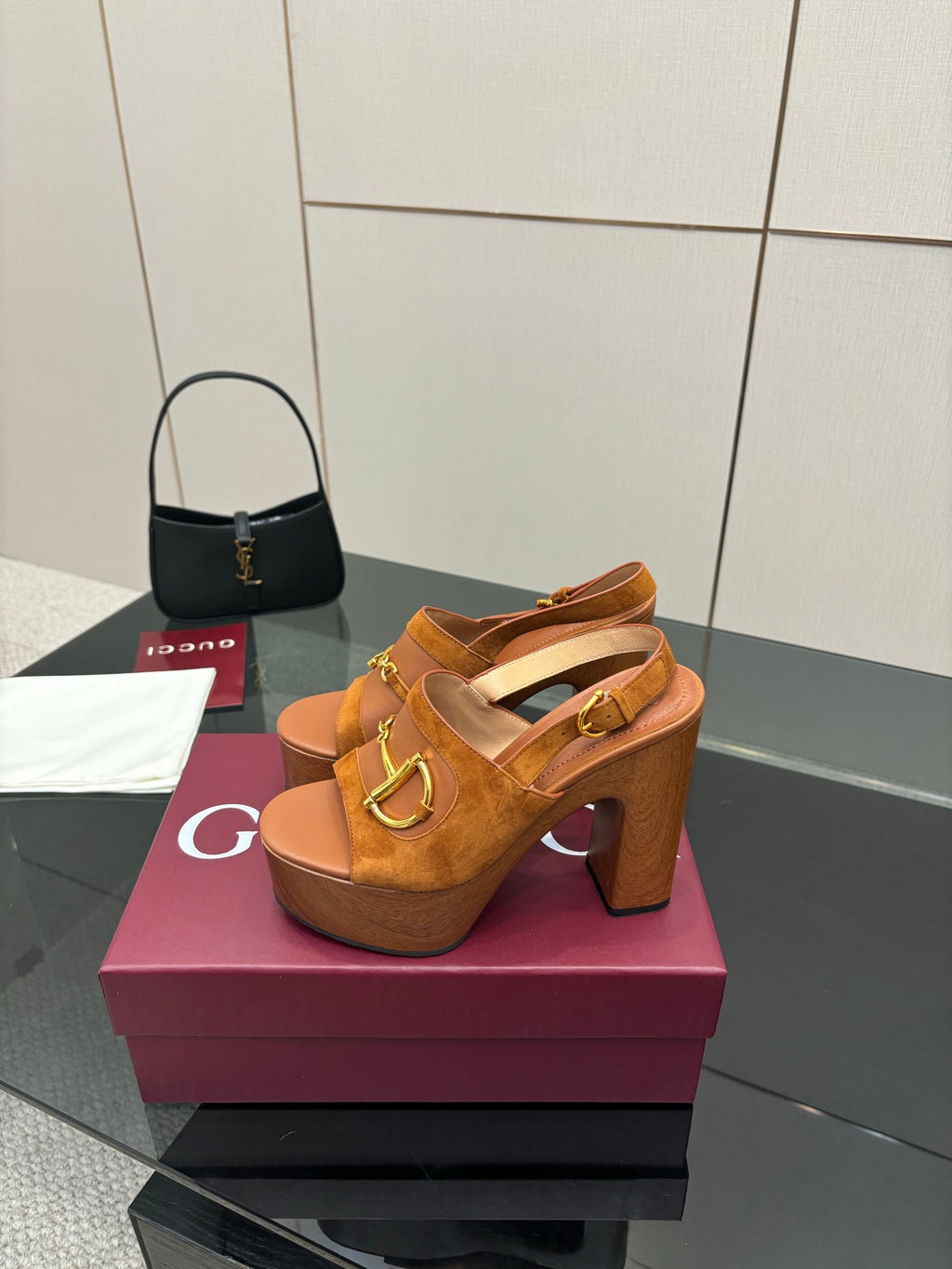 Women’s tan open-toe platform mule sandals with gold buckle strap and block heel