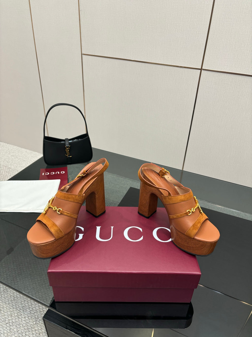 Women’s tan platform mule sandals with gold buckle straps and thick block heels