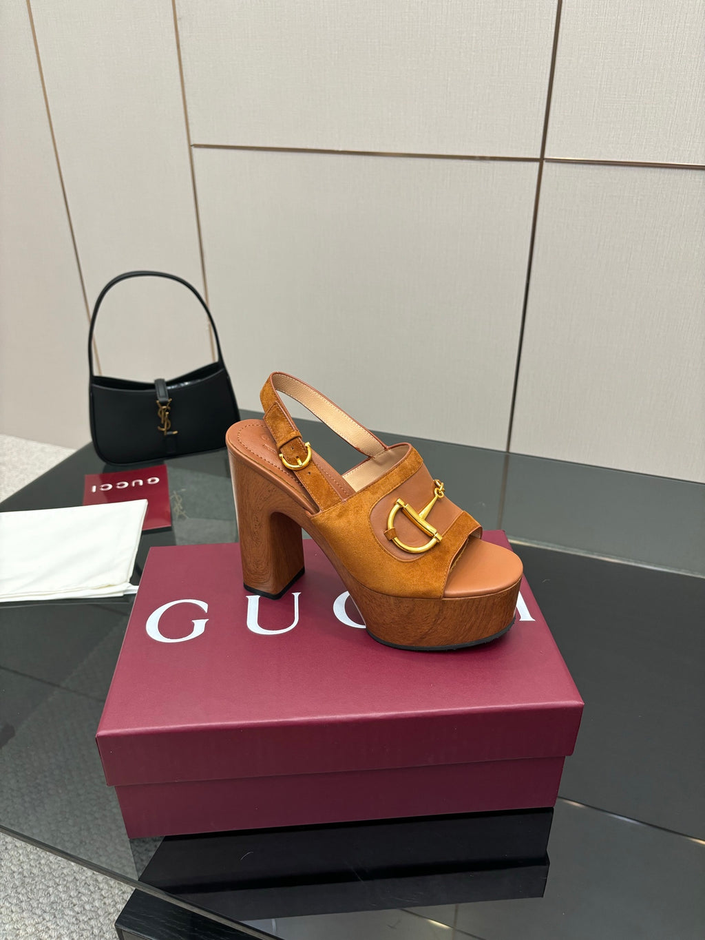 Women’s tan platform mule sandals with gold buckle strap and sturdy block heel