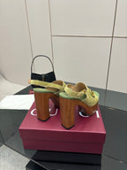 Gucci open-toe platform sandals, lime green with gold buckle, shown from side