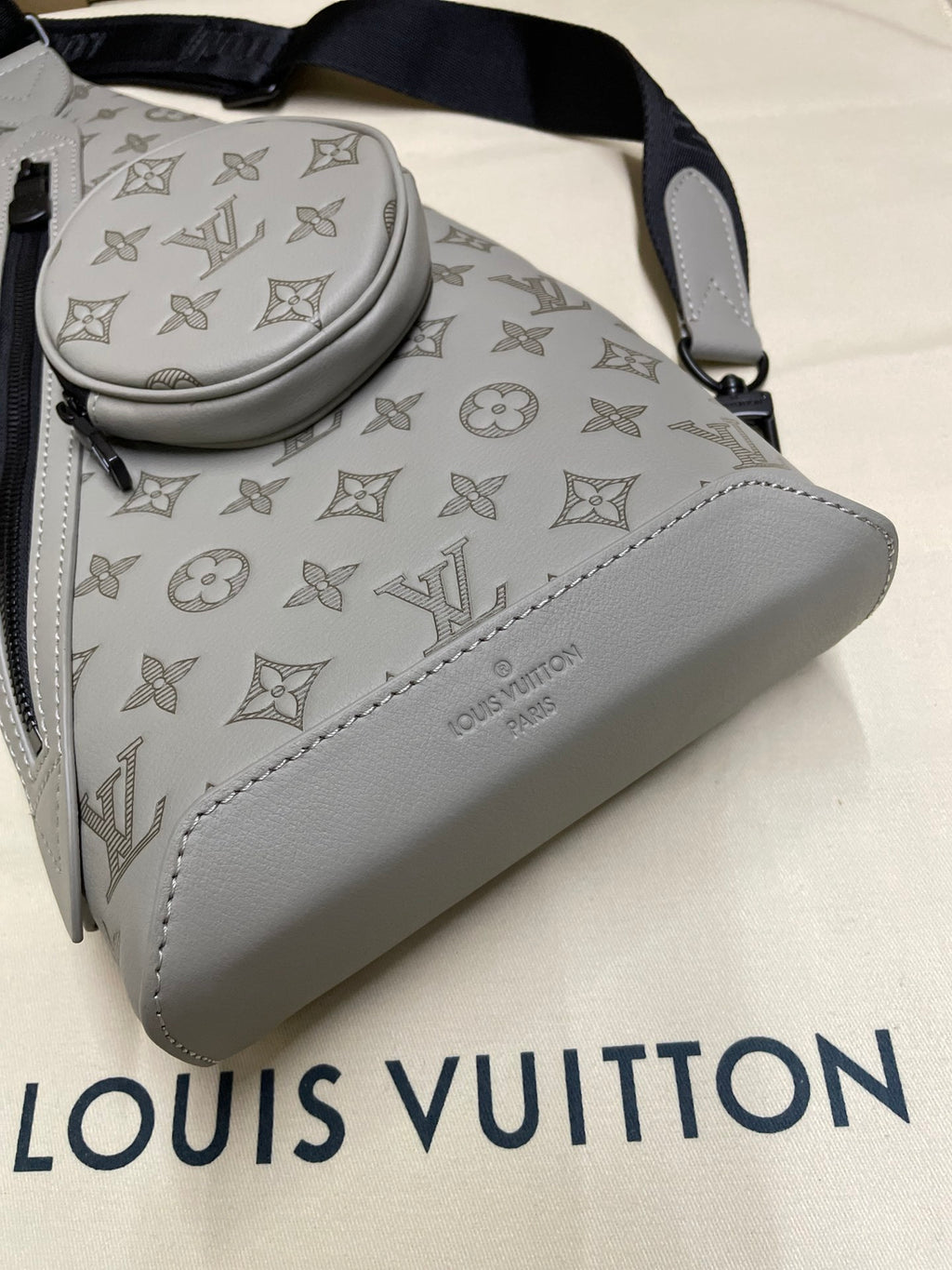 Men's Louis Vuitton monogram sling bag, light gray/white with side zipper pocket
