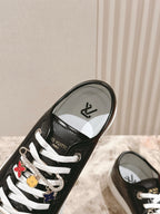 Louis Vuitton unisex sneakers, black toe with logo patch and white laces