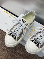 White unisex sneakers with botanical print, lace-up front, and Dior logo tongue